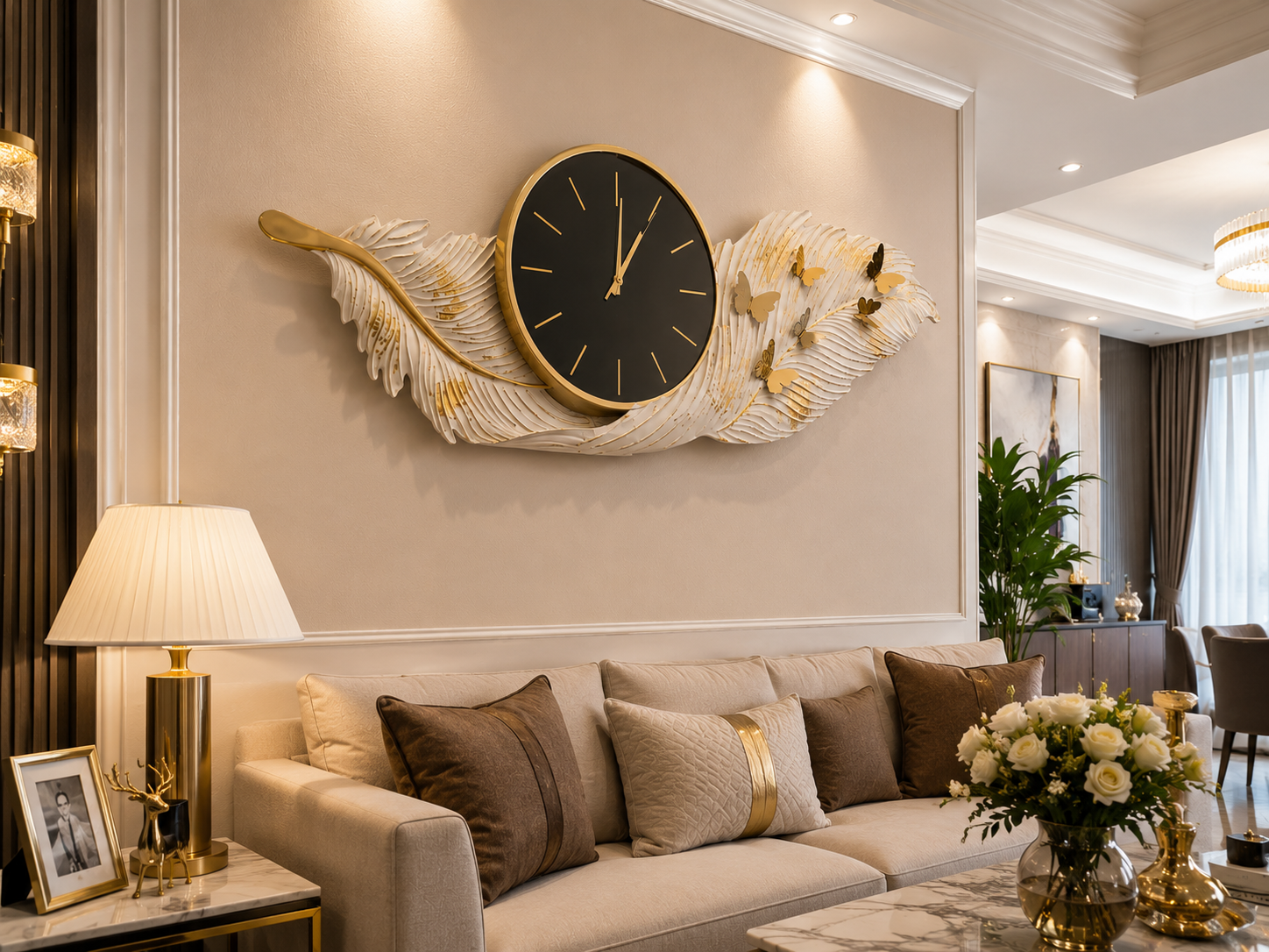 ساعة حائط ستانلس ستيل مودرن بتصميم ريشة مع فراشات – 115 × 55 سم