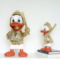 Golden Duck Duo Set – تماثيل بط عصرية (قطعتين)