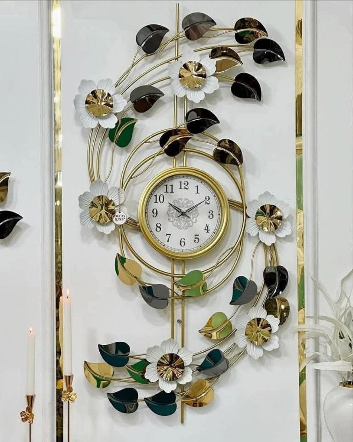 ساعة حائط ديكور فاخرة مقاس 120×60 سم – تصميم ورود وأوراق معدنية باللون الذهبي
