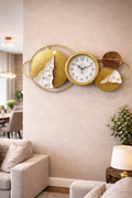 ساعة حائط استانلس ستيل ديكور مودرن ذهبي بتصميم ورد – مقاس 110×55 سم