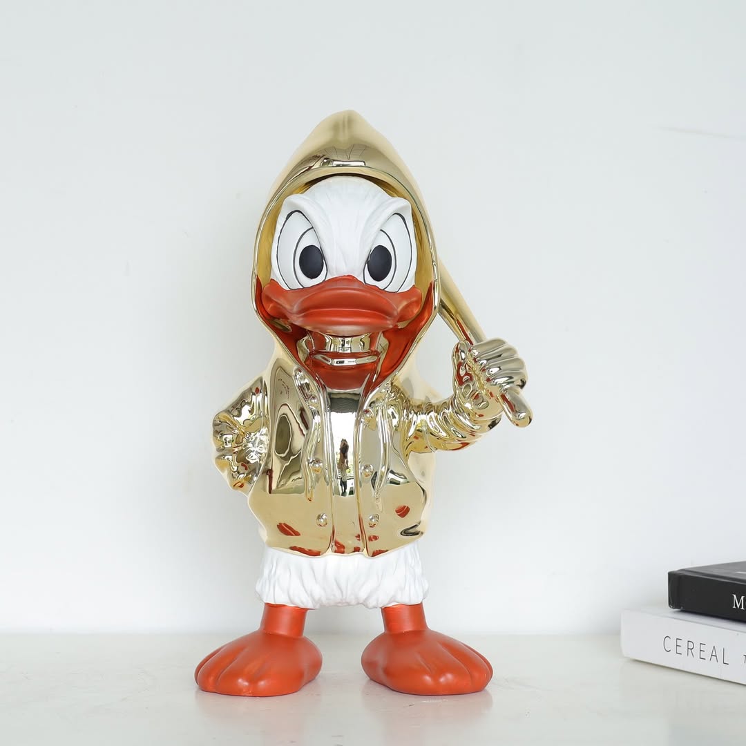 Golden Duck Duo Set – تماثيل بط عصرية (قطعتين)