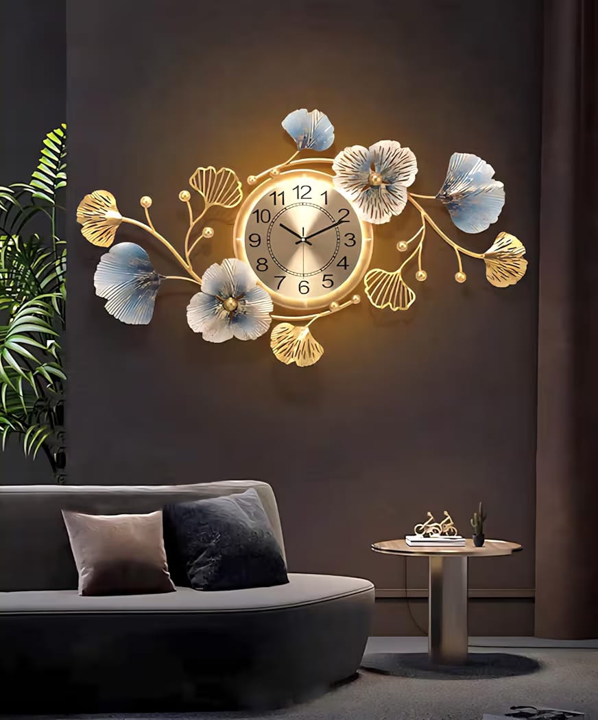 ساعة حائط مودرن مضيئة بتصميم زهور – 83×48 سم