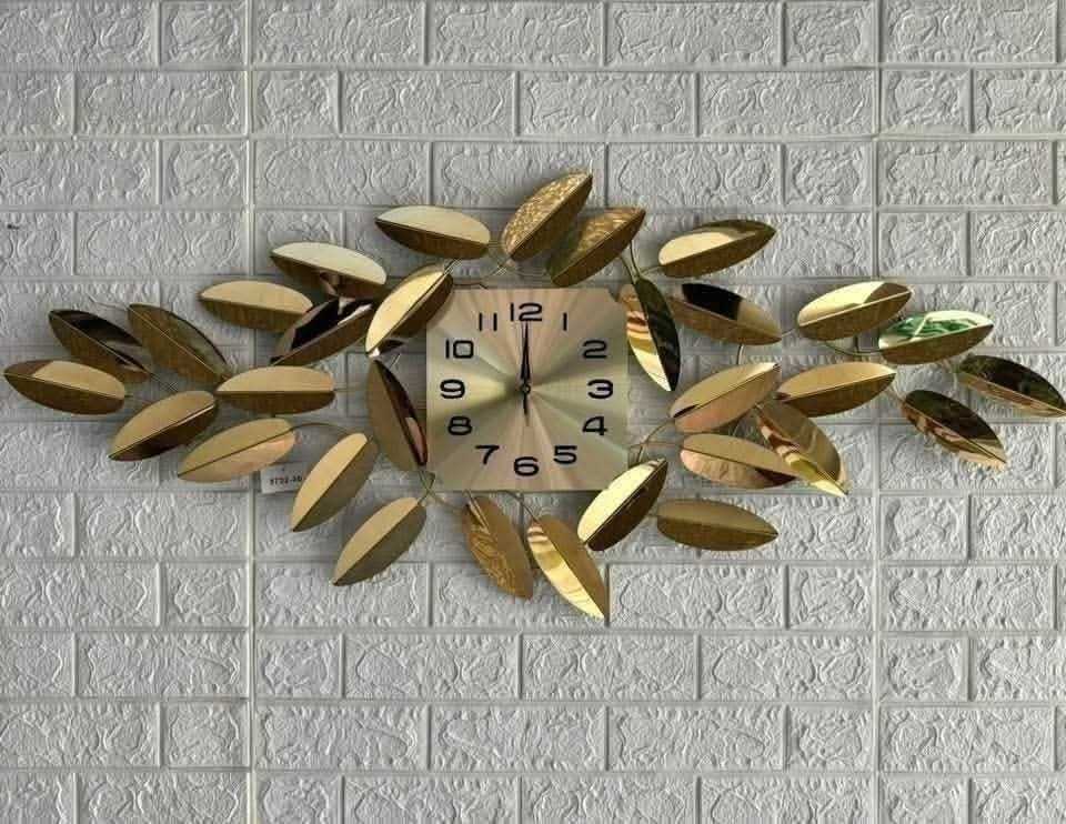 ساعة حائط مودرن بتصميم أوراق ذهبية – ديكور فاخر أنيق 120×50 سم