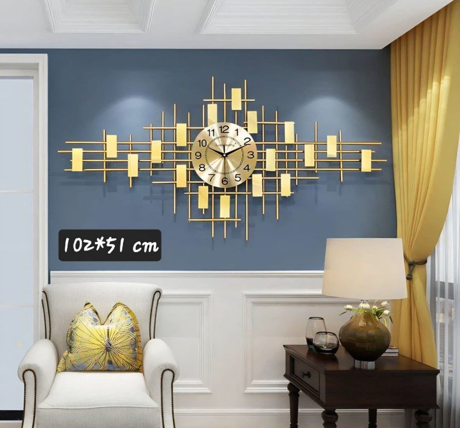 ساعة حائط معدن مودرن تصميم هندسي ذهبي – 102×51 سم