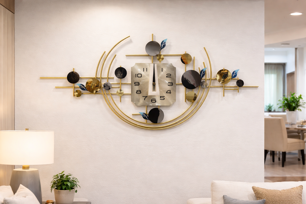 ساعة حائط ديكور مودرن مقاس 115×60 سم – تصميم هندسي بخطوط دائرية باللون الذهبي