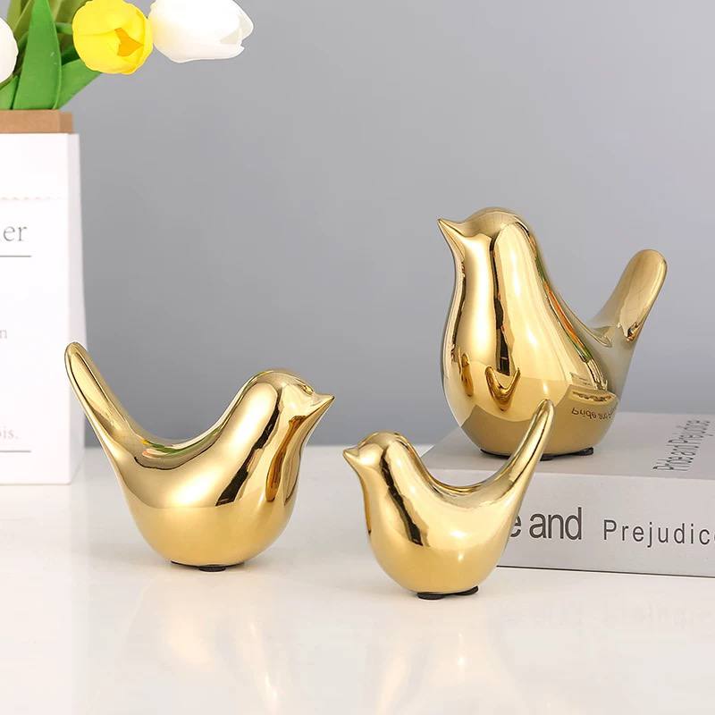 Golden Bird Sculpture Set – تمثال عصفور ذهبي فاخر (قطعتين)