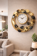 ساعة حائط استانلس ستيل مودرن دائري بتصميم أوراق ذهبية – 60×60 سم